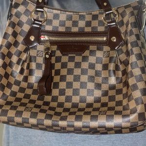 Brand new LV purse never used
